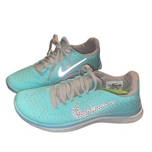 Woman’s Nike FITSOLE2 free 3.0 with crystals